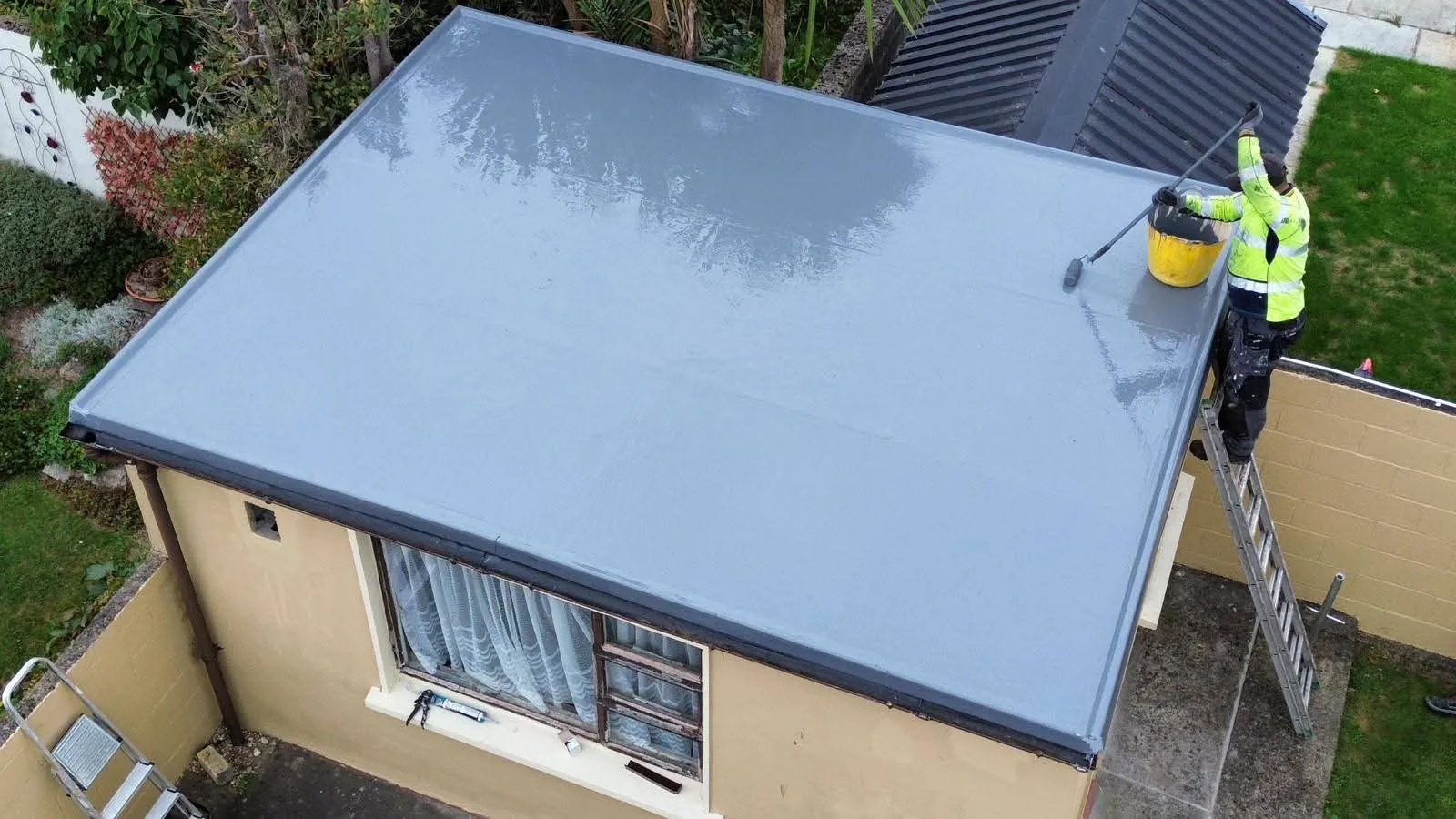Applying the grey Mariseal coating, Blanchardstown