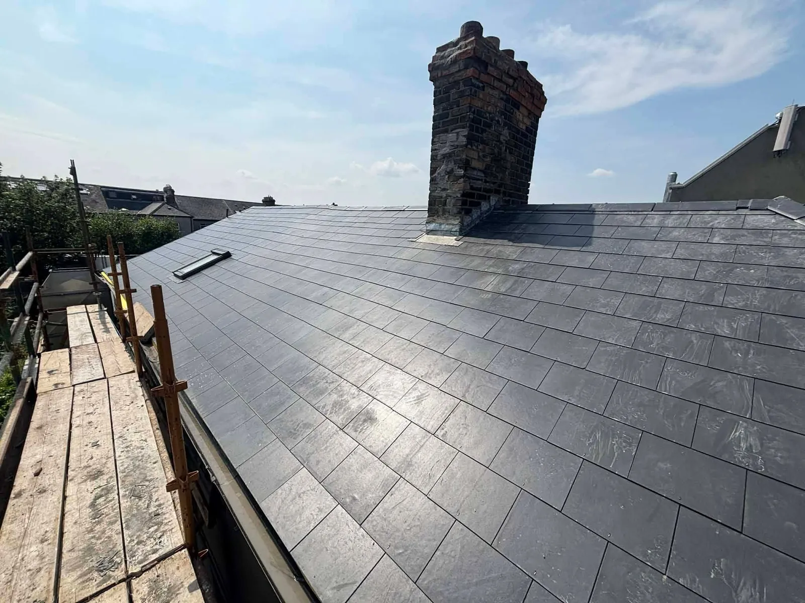 Finished slate roof beside the chimney stack in Ranelagh