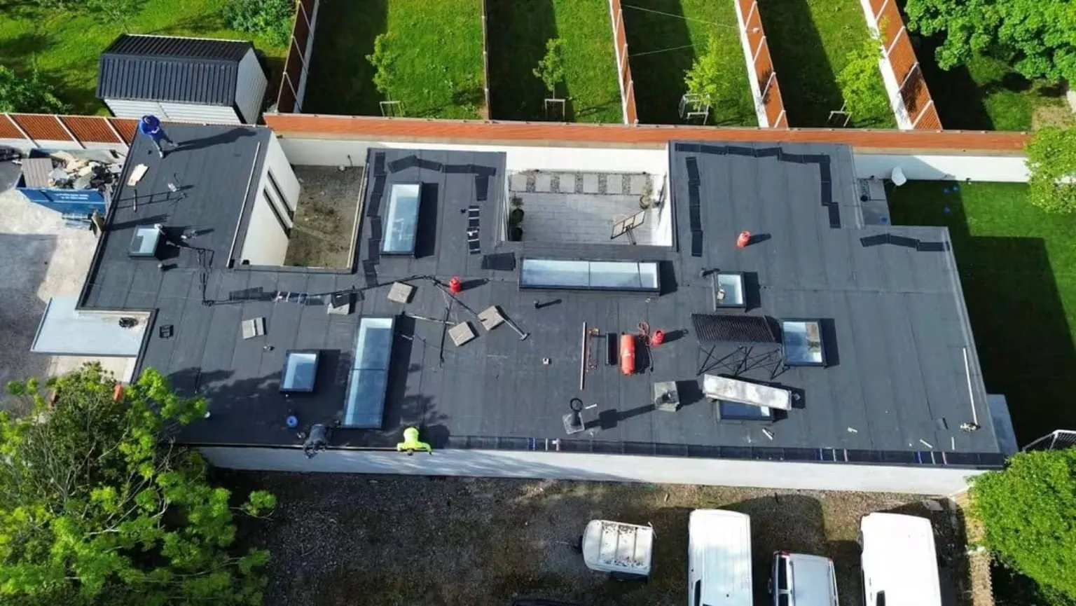 Torch-on felt across the flat roofs of a large house near Blackrock and Dun Laoghaire