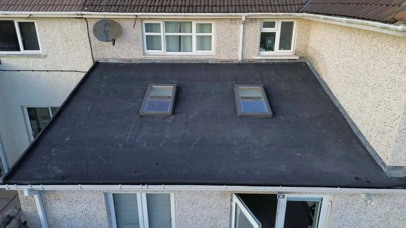 Finished torch-on felt roof with two roof windows in Santry