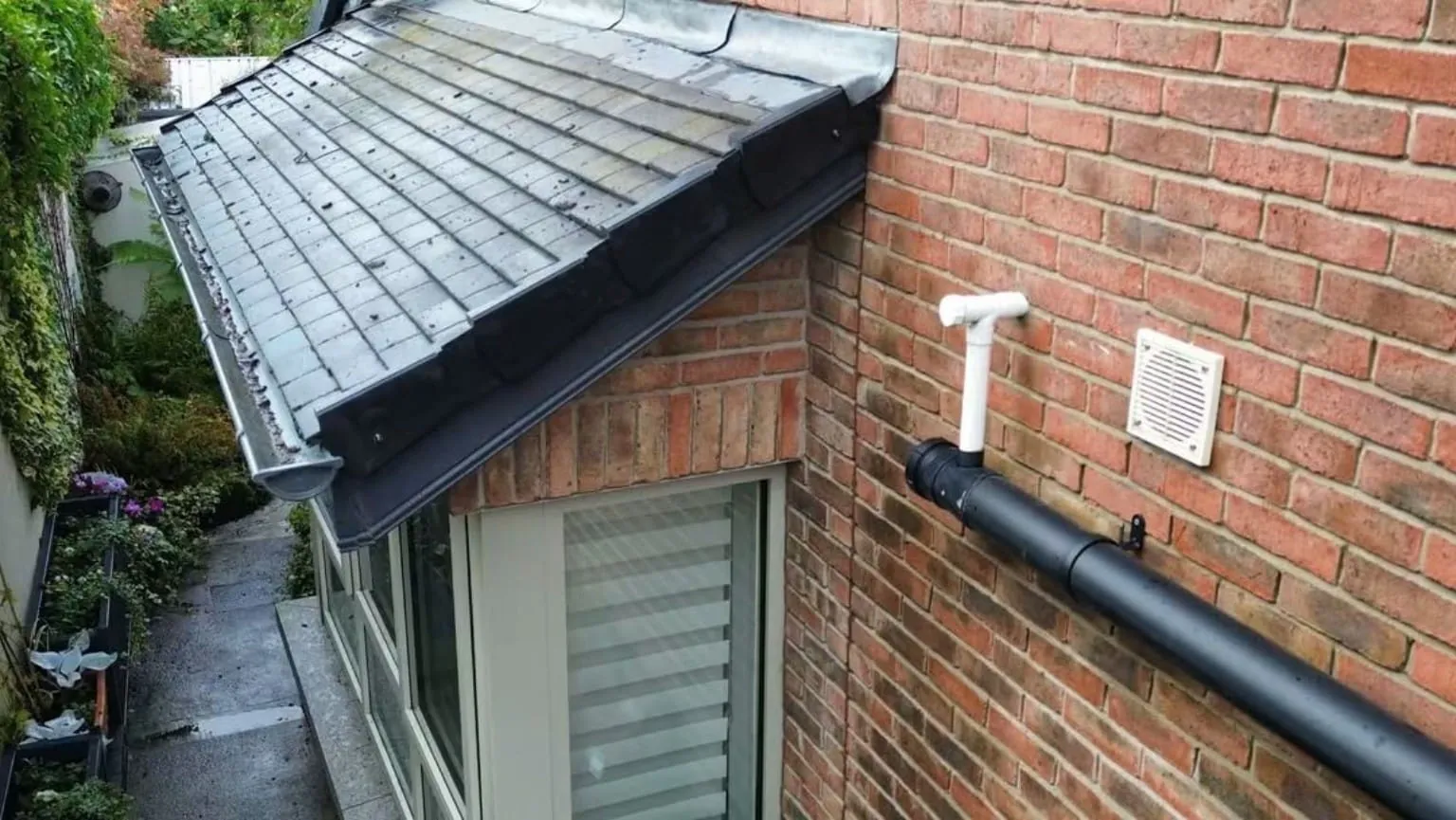 Dry verge on a tiled porch roof