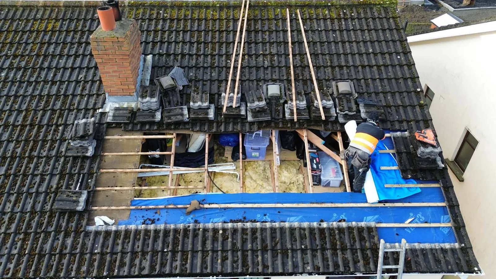 Old battens exposed during a tiled roof repair