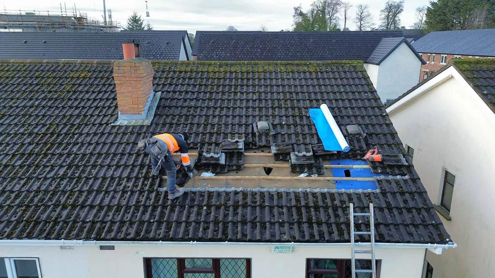 Tiles going back on after a roof repair