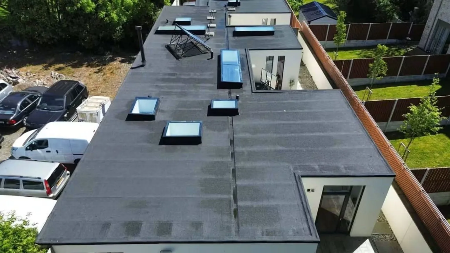 Finished felt flat roof with rooflights