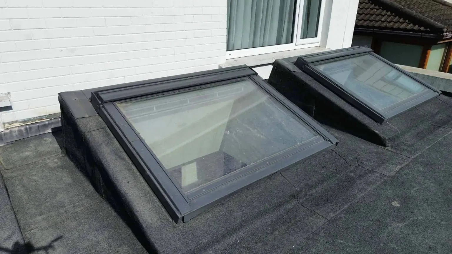 Rooflights set into a torch-on felt roof
