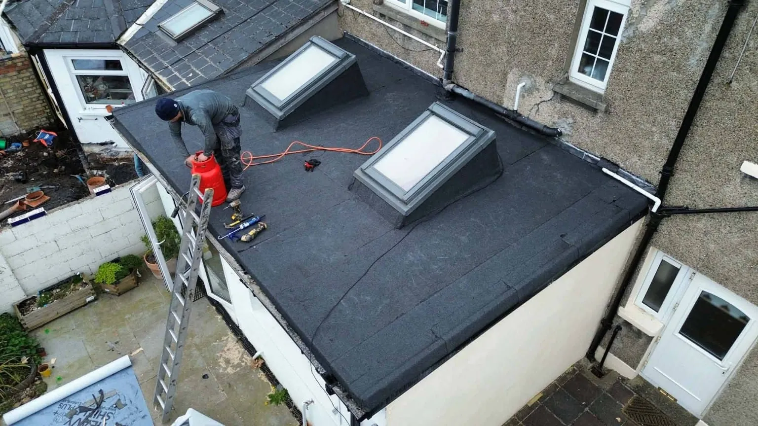 Finished torch-on felt roof with rooflights
