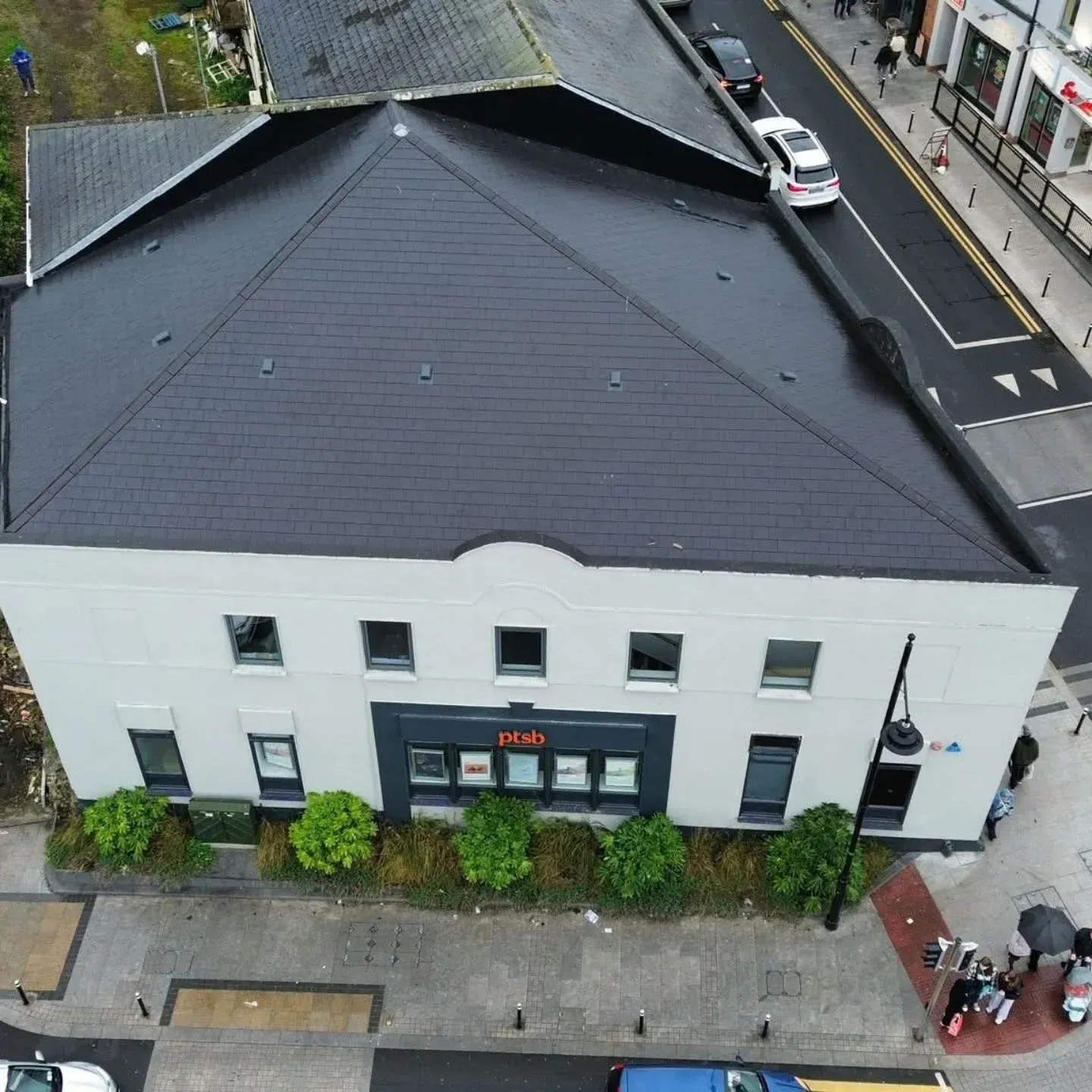 New tiled roof on a two-storey building