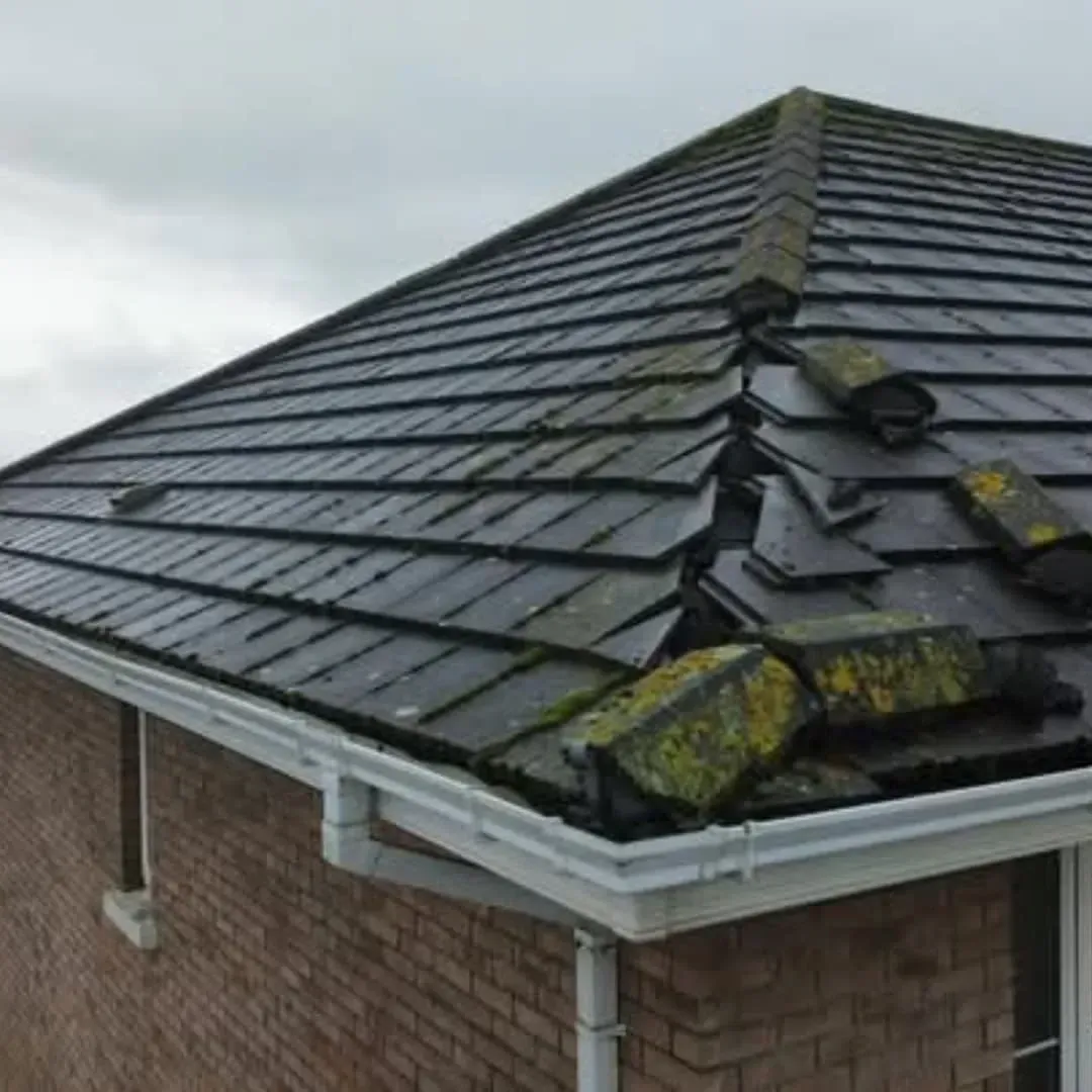 Older concrete tiled roof before work starts