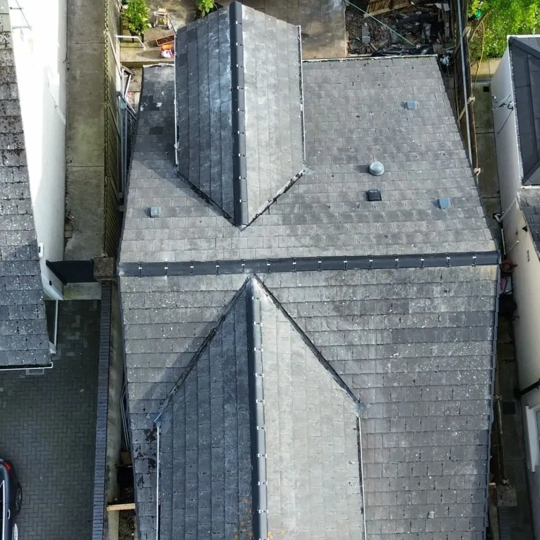 Slate roof around a dormer