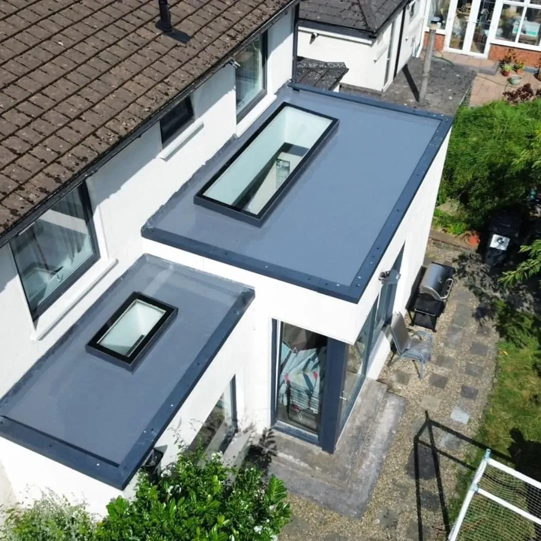 Grey membrane flat roofs with rooflights
